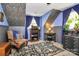 Cozy bedroom with unique wall patterns, natural light, and comfortable furnishings at 9200 Surrey Rd, Mint Hill, NC 28227