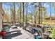Spacious deck overlooking a wooded backyard, ideal for outdoor relaxation and entertaining at 9200 Surrey Rd, Mint Hill, NC 28227