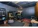 A home exercise room with wood floors and minimalist decor, great for yoga or other personal fitness activities at 9200 Surrey Rd, Mint Hill, NC 28227