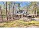 Charming brick home with a well-maintained front yard and a convenient covered parking area at 9200 Surrey Rd, Mint Hill, NC 28227