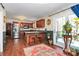 Modern kitchen featuring stainless steel appliances, an island with seating, and access to the outdoors at 9200 Surrey Rd, Mint Hill, NC 28227