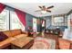 Inviting living room with rich hardwood floors and a comfortable seating area, exuding classic charm at 9200 Surrey Rd, Mint Hill, NC 28227