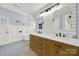 Stylish bathroom with a double sink vanity, subway tile backsplash, and modern fixtures at 110 Sonnys Way, Fort Mill, SC 29708