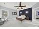 This bedroom features a ceiling fan, natural light, and a modern design at 110 Sonnys Way, Fort Mill, SC 29708