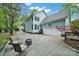 Charming home exterior with a garage, basketball hoop, and outdoor seating at 110 Sonnys Way, Fort Mill, SC 29708