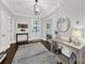 Inviting foyer with hardwood floors, elegant lighting, and stylish decor at 110 Sonnys Way, Fort Mill, SC 29708