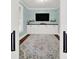 Stylish home office featuring built-in cabinets, a large window, and a decorative rug at 110 Sonnys Way, Fort Mill, SC 29708