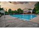 Large outdoor swimming pool with lane markers and a lifeguard stand in a recreational setting at 110 Sonnys Way, Fort Mill, SC 29708