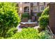 Picturesque courtyard featuring a fountain, lush greenery, and a glimpse of the building's facade at 1101 E Morehead St # 31, Charlotte, NC 28204