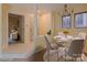 Bright and airy dining area featuring a round table, stylish chairs, and easy access to the living space at 1101 E Morehead St # 31, Charlotte, NC 28204