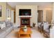 Inviting living room featuring a fireplace, comfortable seating, and a bright, open space at 1101 E Morehead St # 31, Charlotte, NC 28204