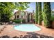 Serene community pool framed by verdant trees, offering a refreshing escape for residents at 1101 E Morehead St # 31, Charlotte, NC 28204