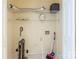Utility room with built in shelving and door, including some cleaning supplies at 1101 E Morehead St # 31, Charlotte, NC 28204