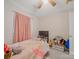 Cozy bedroom featuring a pastel-colored unicorn bedspread, light walls, and a ceiling fan at 1108 Pearson Dr, Rock Hill, SC 29730