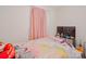 Bright bedroom featuring colorful decor, a cozy bed, and a playful, inviting atmosphere at 1108 Pearson Dr, Rock Hill, SC 29730