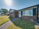Charming brick home showcasing a well-maintained lawn, a tidy walkway, and welcoming curb appeal at 1108 Pearson Dr, Rock Hill, SC 29730