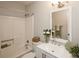 Cozy bathroom with a shower and tub combination, enhanced by neutral wall décor and modern fixtures at 1113 Keswick Pl # 118, Monroe, NC 28112