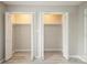 A large closet in a bedroom features folding louvered doors, shelving, and interior lights at 1113 Keswick Pl # 118, Monroe, NC 28112