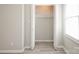 Spacious closet featuring an open bi-fold door and ample storage space, offering convenience and organization at 1113 Keswick Pl # 118, Monroe, NC 28112