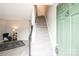 Inviting entryway featuring a staircase leading upstairs and a view into the living area at 1113 Keswick Pl # 118, Monroe, NC 28112