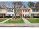 Charming townhomes featuring colorful doors, shutters and well-maintained lawns at 1113 Keswick Pl # 118, Monroe, NC 28112