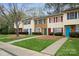 Charming townhomes featuring colorful doors, shutters and well-maintained lawns at 1113 Keswick Pl # 118, Monroe, NC 28112