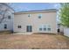 A spacious backyard with grass and patio, perfect for outdoor activities and relaxation at 125 Colville Rd, Mooresville, NC 28117