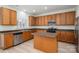 Well-equipped kitchen featuring an island, stainless steel appliances, and plenty of counter space at 125 Colville Rd, Mooresville, NC 28117