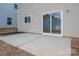 Outdoor patio area with sliding glass doors, ideal for entertaining or relaxing at 125 Colville Rd, Mooresville, NC 28117