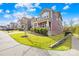 Beautiful two-story home featuring a front porch, complemented by lush green lawn and sidewalk at 12706 Heath Grove Dr, Huntersville, NC 28078
