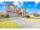 Charming two-story home with attached garage and manicured lawn in a suburban neighborhood at 12706 Heath Grove Dr, Huntersville, NC 28078