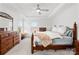 Spacious main bedroom with tray ceiling, large windows and traditional furnishings at 12706 Heath Grove Dr, Huntersville, NC 28078