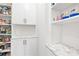 Walk-in pantry features ample shelving and storage space, providing plenty of room for organizing kitchen essentials at 12706 Heath Grove Dr, Huntersville, NC 28078