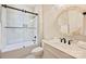 Bright bathroom with a shower over tub, modern fixtures, and stylish vanity at 12912 Bailey Rd, Cornelius, NC 28031