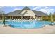Upscale community pool with inviting lounge area perfect for relaxation and socializing in a resort-like setting at 12912 Bailey Rd, Cornelius, NC 28031