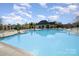 Large community pool offers a refreshing escape, complete with lounge chairs and ample space for recreation at 12912 Bailey Rd, Cornelius, NC 28031
