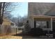 Exterior side view of home featuring a fenced yard at 13016 Meadowmere Rd, Huntersville, NC 28078