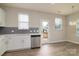 Bright kitchen with stainless appliances, quartz counters and lots of natural light at 13304 Porter Creek Rd, Charlotte, NC 28262