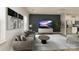 Staged living room featuring modern decor, a large TV, and a comfortable seating area at 13304 Porter Creek Rd, Charlotte, NC 28262