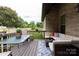 Inviting back deck with patio furniture, potted plants, and decorative accents, great for outdoor enjoyment at 1358 37Th Avenue Ne Pl, Hickory, NC 28601
