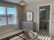 Bright bedroom with window, dresser, and ensuite bathroom at 1358 37Th Avenue Ne Pl, Hickory, NC 28601