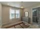 Bedroom with adjoining bathroom and an attractive light fixture at 1358 37Th Avenue Ne Pl, Hickory, NC 28601