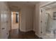 Hallway with wood floors connecting bedroom and bathroom at 1358 37Th Avenue Ne Pl, Hickory, NC 28601