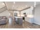Modern kitchen with stainless steel appliances, white cabinets, hardwood floors and island at 1358 37Th Avenue Ne Pl, Hickory, NC 28601