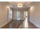 Large main bedroom with neutral colors, tray ceiling, and direct access to ensuite bathroom and walk-in closet at 1358 37Th Avenue Ne Pl, Hickory, NC 28601