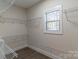 This walk-in closet provides an organized storage system with shelving and hanging space, enhancing functionality at 1358 37Th Avenue Ne Pl, Hickory, NC 28601