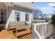 Inviting outdoor deck area with wooden furniture, perfect for relaxing and enjoying the weather at 14024 Alley Son St, Huntersville, NC 28078
