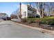 Charming exterior view with a white picket fence, manicured bushes, and classic architecture at 14024 Alley Son St, Huntersville, NC 28078
