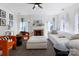 Cozy living room with a fireplace, large sofa, and comfortable seating, perfect for relaxing at 14024 Alley Son St, Huntersville, NC 28078