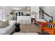 Bright living space with an open floor plan, combining modern decor and comfortable seating, ideal for relaxation at 14024 Alley Son St, Huntersville, NC 28078